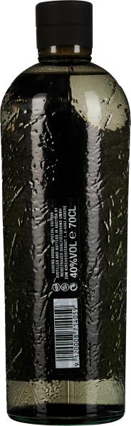 Geriffelte Glasflasche mit schwarzem Verschluss, transparent und grünlich schimmernd.