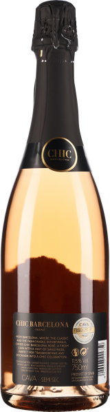 Roséfarbene Sektflasche mit schwarzem Etikett und goldener Verzierung.