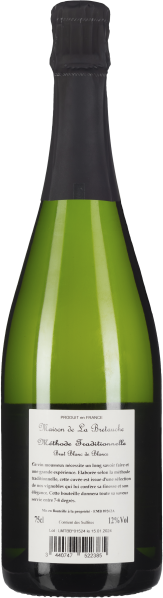 Grüne Weinflasche mit schwarzem Hals und Etikett auf der Rückseite.