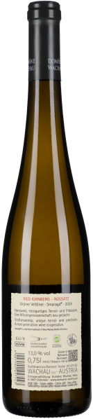 Schlanke, braungelbe Weinflasche mit schwarzem Hals und detailliertem Etikett auf Rückseite.