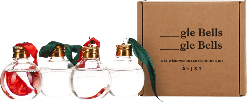 Vier runde Glasfläschchen mit goldenen Schraubverschlüssen, gefüllt mit klarem Getränk. Einige enthalten rote Streifen, und alle haben dekorative Bänder in Rot und Grün. Rechts daneben eine braune Kartonverpackung.