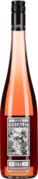 Die Weinflasche zeigt einen Roséwein in einem schlanken, klaren Glas mit einem schwarzen Schraubverschluss. Das Etikett präsentiert ein stilisiertes Trauben- und Blattmotiv in Schwarz-Weiß. Die Flüssigkeit hat eine hellrosa Farbe.