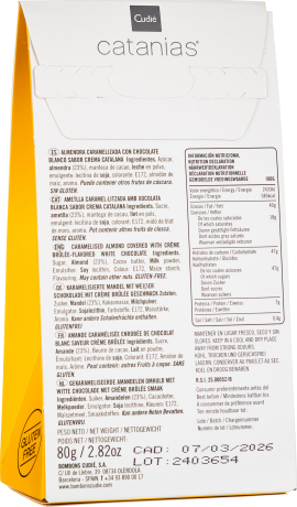 Weiße Verpackung mit gelbem Seitenteil, Text in verschiedenen Sprachen und glutenfreie Kennzeichnung.