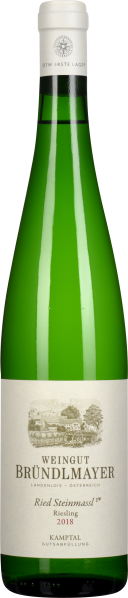 Grüne Weinflasche mit schlichtem, illustriertem Etikett.