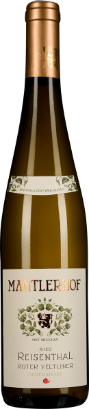Die Flasche zeigt einen hellgoldenen Weißwein in einer eleganten, schlanken Form mit einem goldenen Schraubverschluss. Das Etikett ist cremefarben mit dekorativen, grünen Weinrebenverzierungen und einem zentralen Wappen.