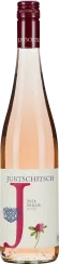 Flasche Roséwein mit klarem, zart rosa Farbton. Etikett mit dekorativen Elementen, darunter ein großes rotes "J", blaue Verzierungen und eine kleine Blume. Verschluss in dunklem Rot gehalten.