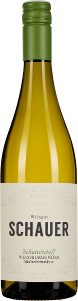 Eine Weinflasche mit hellgelbem Inhalt, grünem Schraubverschluss und einem eleganten cremefarbenen Etikett mit schwarzer und grüner Schrift.