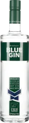 Die Gin-Flasche ist schlank und durchsichtig, mit einem grün-weißen Etikett und dezenten Rillen in der Glasstruktur. Der grüne Verschluss ist schlicht gestaltet, und das Design vermittelt einen hochwertigen, organischen Eindruck.