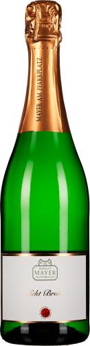 Grüne Sektflasche mit goldenem Folienverschluss und elegantem Etikett.