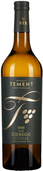 Eine Weinflasche mit einem eleganten, goldenen Etikett und dunkelgrünem Hintergrund. Die Flasche hat einen dunklen Hals mit goldenen Details.