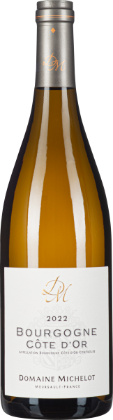 Die Weinflasche hat ein elegantes, schlankes Design mit einer beige-goldenen Flüssigkeit. Sie besitzt ein mattes, graues Etikett mit goldfarbener Schrift und dezenter Verzierung. Der Flaschenhals ist mit einer eleganten, dunklen Kapsel gekrönt.