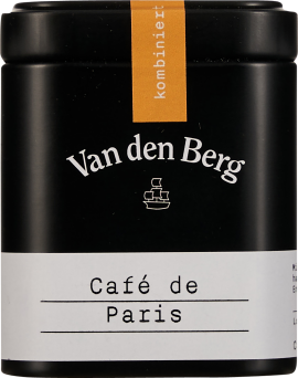 Schwarze, rechteckige Metalldose mit matt-finish, markantem weißen Etikett und orangefarbenem Streifen auf dem Deckel.