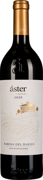 Eine schlanke Weinflasche mit goldenem Schraubverschluss. Das Etikett ist überwiegend weiß mit einer feinen Goldprägung eines Gebäudes und wellenförmigem, reliefartigem Muster. Darunter befinden sich schwarze Schriftzüge.