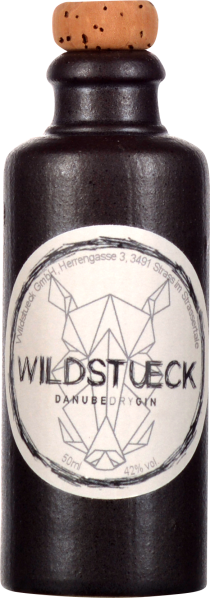 Dunkle, matte Flasche mit Korkverschluss und geometrischem Design auf dem Etikett.