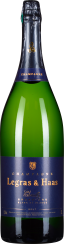 Grüne Champagnerflasche mit dunkelblau-goldenem Etikett und Verschluss.