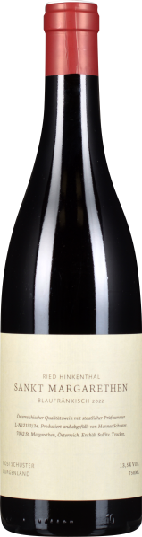 Eine Weinflasche mit rotem Korken, schlankem schwarzen Flaschenkörper und einem schlichten, cremefarbenen Etikett.