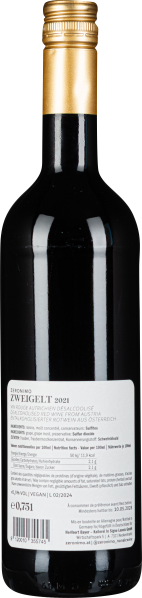 Schwarze Flasche mit goldenem Schraubverschluss und weißem Etikett auf der Rückseite.