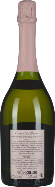 Grüne Flasche mit rosa Kapsel und klassischem Etikett.