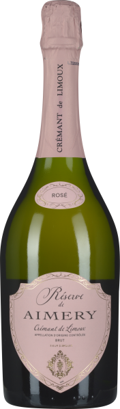 Eine dunkelgrüne Sektflasche mit rosa Etikett und Kapsel. Das Etikett zeigt dekorative Schrift und feine goldene Details.