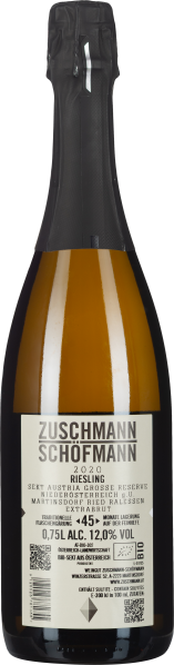 Sektflasche mit schwarzem Verschluss und heller, informativer Etikettengestaltung.