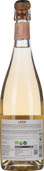 Durchsichtige Sektflasche mit Korkverschluss und beige Etikett am Flaschenhals.