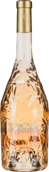 Roséwein in einer kunstvoll gestalteten, facettierten Glasflasche mit goldfarbenem Verschluss.