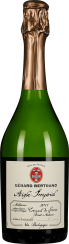 Grüne Sektflasche mit goldener Folie und elegantem Etikett.