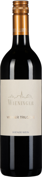 Die Weinflasche hat eine dunkelrote, fast schwarze Farbe und einen goldfarbenen Schraubverschluss. Das Etikett ist cremefarben mit silberner und goldener Schrift, darauf sind stilisierte, urbane Silhouetten zu sehen.