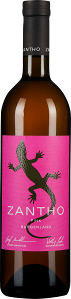 Eine Weinflasche mit einem auffälligen pinken Etikett, auf dem eine schwarze Eidechse abgebildet ist. Der Flaschenkörper ist braun und hat einen schwarzen Hals mit weißem Text.