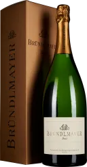 Große grüne Weinflasche mit goldenem Hals und Etikett, neben einer eleganten, braunen Geschenkbox.