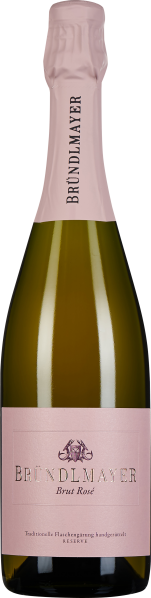 Eine Flasche Rosé-Schaumwein mit rosa Verschlusskapsel und passendem Etikett, das elegant gestaltet ist und Feingefühl vermittelt. Die Flasche hat eine klassische Champagnerform.