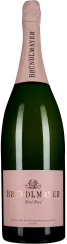 Grüne Sektflasche mit elegantem, rosafarbenem Etikett und passendem Flaschenhals. Das Etikett weist goldene Schrift auf und zeigt ein stilisiertes Logo.