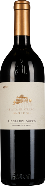 Dunkle Weinflasche mit goldener Kapsel, cremefarbenem Etikett mit goldenen und schwarzen Akzenten, feiner Schrift und einer stilisierten Abbildung eines Gebäudes in der Mitte.