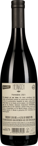 Flasche mit etikettiertem Rückenetikett, schwarzem Verschluss und glänzend dunkelbraunem Glas.