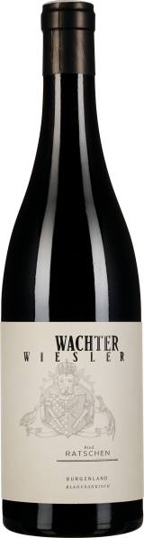 Flasche Rotwein mit dunklem, glänzendem Glaskörper, einer schwarzen Kapsel und einem dezenten Etikett in Cremefarben mit detaillierter Grafik.