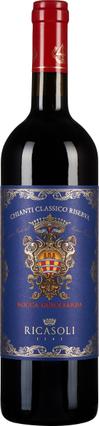 Eine Weinflasche mit dunkelrotem Wein, verziert mit einem tiefblauen Etikett, das ein kunstvolles Wappen im Zentrum zeigt. Der Flaschenhals ist mit einer roten Kapsel versehen.