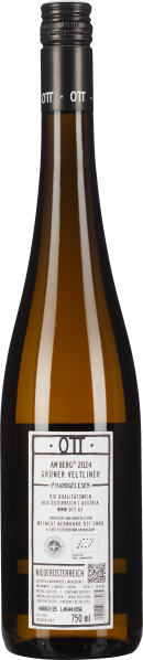 Braune Weinflasche mit weißem Etikett und schwarzem Schraubverschluss.