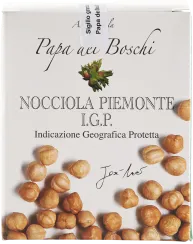 Die Verpackung zeigt zahlreiche naturbelassene Haselnüsse auf einem weißen Hintergrund, mit einem kleinen Bild von Haselnüssen und Blättern in der Mitte.