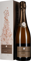 Flasche Champagner mit goldener Folie auf dem Korken und elegantem Etikett. Die Verpackung zeigt ein zartes Blumenmotiv in sanften Rosa- und Beigetönen.