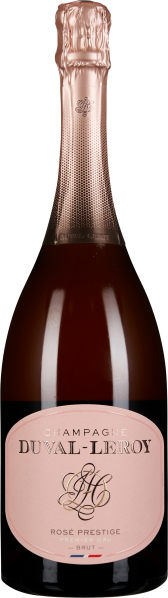 Flasche Rosé-Champagner mit zartrosa Etikett und goldenem Flaschenverschluss, das Glas der Flasche schimmert in einem tiefen Roséton.