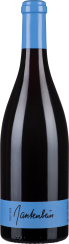 Weinflasche mit schwarzem Etikett und leuchtend blauem Hals und Kapsel.