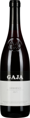 Flasche mit dunkelrotem Wein, schlankem Hals und elegantem Etikett, das den klassischen Look eines hochwertigen italienischen Weins vermittelt.