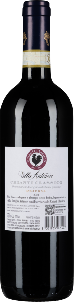 Dunkle Weinflasche mit elegantem Etikett und blauem Verschluss.