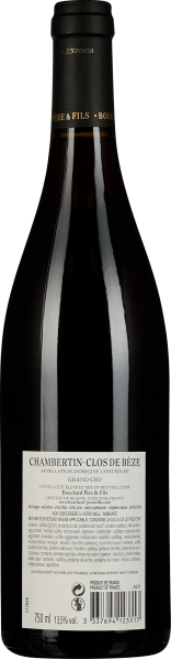 Dunkle Weinflasche mit goldener Halskapsel, elegantes und schlichtes Etikett.