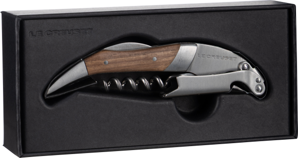 Kellnermesser mit elegantem Holzgriff und Metallbeschlägen, abgebildet vor einer schwarzen, rechteckigen Aufbewahrungsbox.