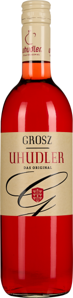 Flasche mit rotem Wein und cremefarbenem Etikett, verziert mit einem stilisierten Wappensymbol und großen Schriftzügen.