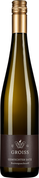 Eine schlanke Weinflasche mit goldfarbenem Schraubverschluss und dunklem Etikett.