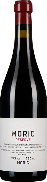 Dunkelrote Weinflasche mit rotem Verschluss und schlichtem, weißem Etikett.