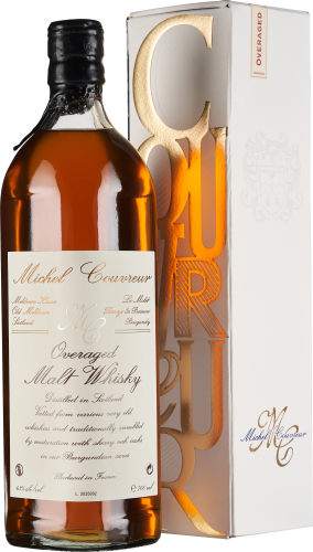 Braune Whiskyflasche mit heller Etikettierung, daneben eine elegante, weiße Verpackung mit goldenen Details.